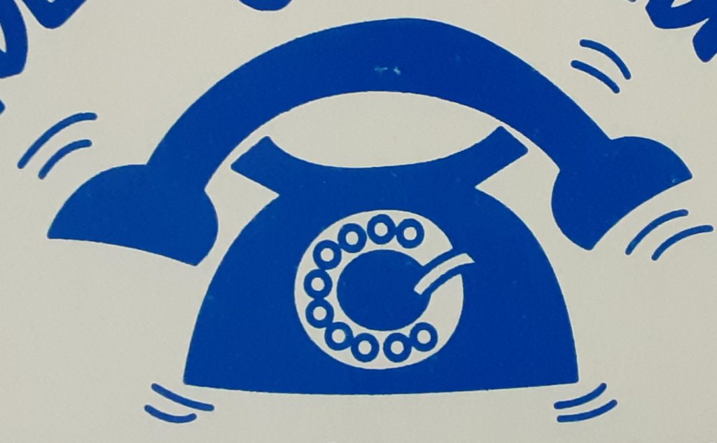 Blaues Telefon-Logo mit einem stilisierten Telefonhörer und einer Wählscheibe in der Mitte.
